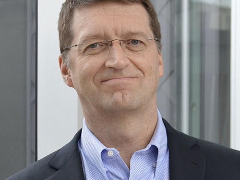 A portrait of Tuomas Sandholm.