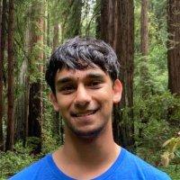 Portrait Photo of Gaurav Arya in front of trees